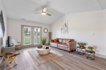 A living room with a couch and a coffee table