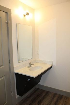 Plainfield apartment for rent - a small bathroom with a sink and a mirror  at Haven Homes Apartments, LP, Plainfield, Indiana