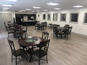 Hobart apartment for rent - a large room with tables and chairs and a kitchen