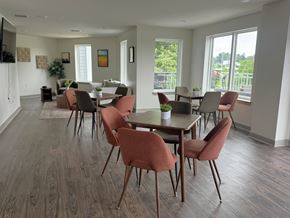 Bloomington apartment for rent - A dining room with a long table and chairs.