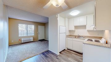 Montclair apartment for rent - A kitchen with white cabinets and a countertop.