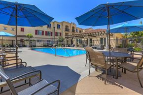 Chino apartment for rent - our apartments have a pool and tables with umbrellas