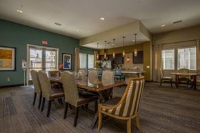 Chino apartment for rent - a large dining room with a table and chairs