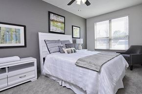 Arlington apartment for rent - a bedroom with a bed and a closet