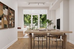 Los Angeles apartment for rent - A dining room with a table and chairs and a painting on the wall.