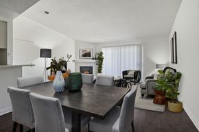 Northridge apartment for rent - A dining room with a table and chairs.