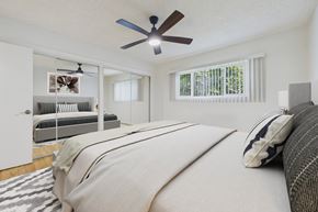 Sherman Oaks apartment for rent - A bedroom with a large bed and a ceiling fan.