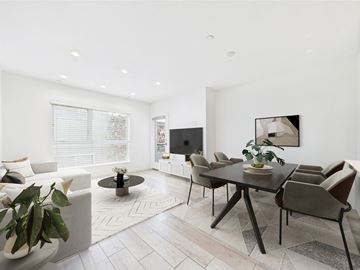 Los Angeles apartment for rent - A modern living room with a black table and chairs.
