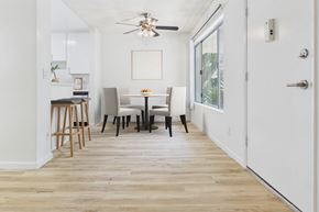Sherman Oaks apartment for rent - A dining room with a table and chairs.
