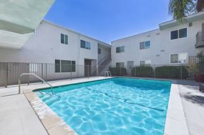 Van Nuys apartment for rent - A swimming pool in a sunny day.
