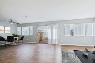 North Hills apartment for rent - A living room with a dining table and chairs.