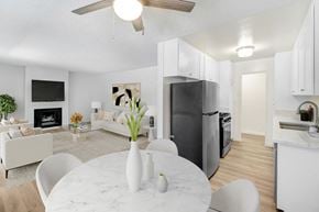 Los Angeles apartment for rent - A modern kitchen with a white table and chairs.