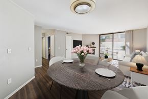 Los Angeles apartment for rent - A dining room with a round table and chairs.