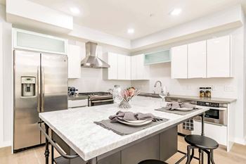Stainless-steel dishwasher, oven, microwave drawer and range hood