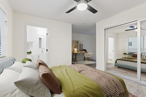 Santa Monica apartment for rent - A bedroom with a bed, pillows, and a ceiling fan.