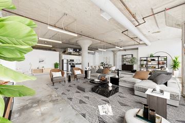 Los Angeles apartment for rent - A modern living room with a grey carpet and white furniture.