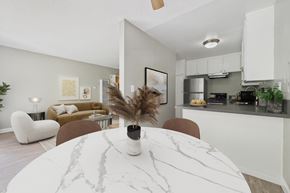 Torrance apartment for rent - A modern dining room with a marble table and chairs.