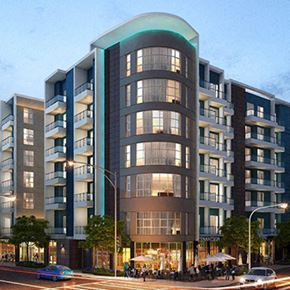 Los Angeles apartment for rent - A modern apartment building with a curved glass facade and balconies.