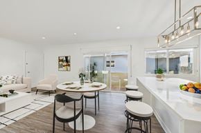 Burbank apartment for rent - A modern dining room with a white table and chairs.