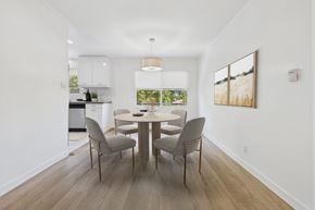 Santa Monica apartment for rent - A dining room with a table and chairs.