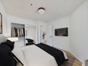 Los Angeles apartment for rent - A bedroom with a bed and a wardrobe.