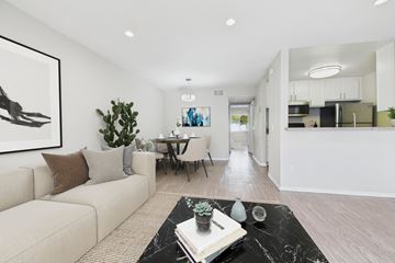 Reseda apartment for rent - A living room with a couch, a coffee table, and a painting on the wall.
