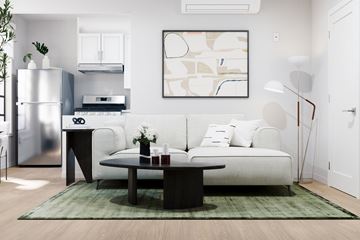 Los Angeles apartment for rent - A modern living room with a white sofa and a coffee table.