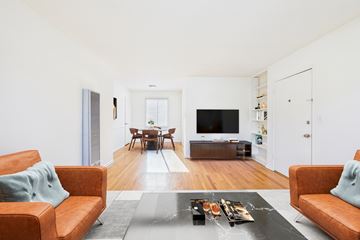 Santa Monica apartment for rent - A living room with a brown couch and a coffee table.