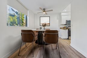 Sherman Oaks apartment for rent - A dining room with a table and chairs.