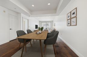 Sherman Oaks apartment for rent - A dining room with a wooden table and chairs.
