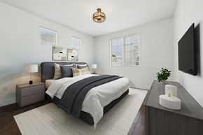 Sherman Oaks apartment for rent - A bedroom with a large bed and a flat screen TV mounted on the wall.