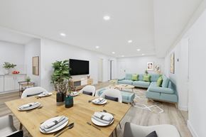 Sherman Oaks apartment for rent - A modern dining room with a wooden table set for six.