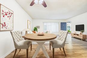 Sherman Oaks apartment for rent - A dining room with a round table and chairs.