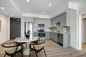 Los Angeles apartment for rent - A modern kitchen with a dining table and chairs.