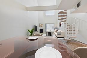 Valley Village apartment for rent - A modern dining room with a glass table and chairs.