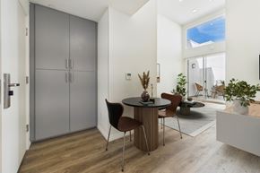 Van Nuys apartment for rent - A modern dining room with a table set for two.