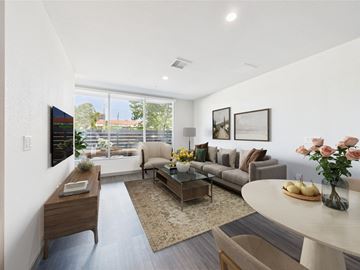 Los Angeles apartment for rent - A living room with a grey couch and a coffee table.