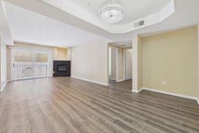 Los Angeles apartment for rent - A living room with a fireplace and a television.