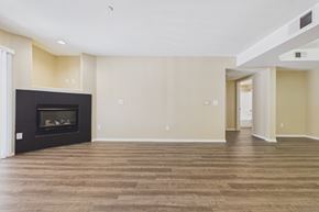 Los Angeles apartment for rent - A living room with a fireplace and wood flooring.
