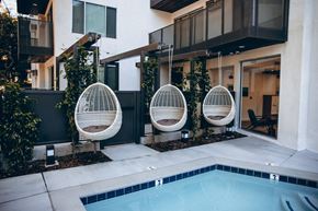 Los Angeles apartment for rent - Pool with an outdoor hanging rattan egg chairs