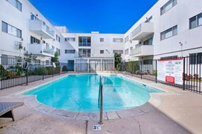 Studio City apartment for rent - a swimming pool in front of an apartment building