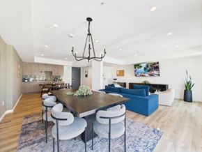 Los Angeles apartment for rent - A dining room with a wooden table and grey chairs.
