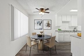 Bellflower apartment for rent - our apartments offer a dining room and kitchen with a ceiling fan