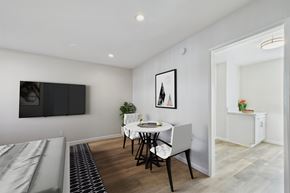 Mission Hills apartment for rent - A dining room with a white table and chairs.