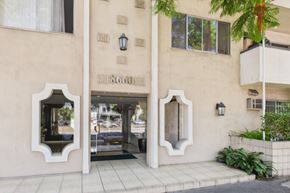 Los Angeles apartment for rent - The image shows a building with a beige facade and a sign that reads "1860".