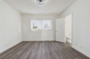 Bellflower apartment for rent - A room with a window and a toilet in it.