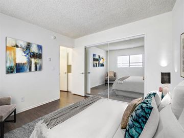 Los Angeles apartment for rent - A living room with a white couch and a painting on the wall.