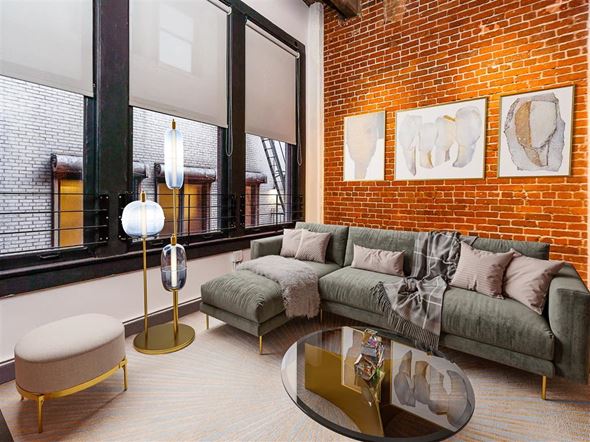 Los Angeles apartment for rent - Apartments In Downtown Los Angeles, CA, for Rent - Broadway Lofts - Loft Style Living Room With High Ceilings, Exposed Brick Walls, Concrete Columns, And Floor-To-Ceilings Windows.