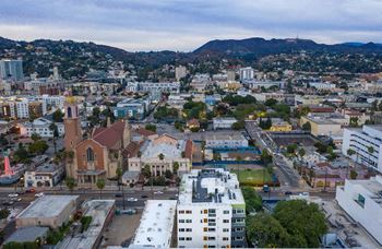 Rooftop panoramic views of downtown la, the hollywood sign, and century city