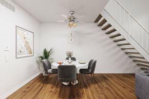 Sherman Oaks apartment for rent - a dining room with a table and chairs and a ceiling fan